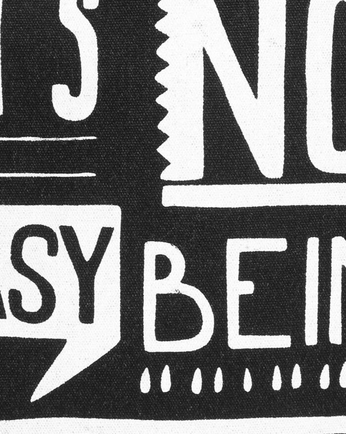 Bad Habit Black Typographic Backpack Close-Up Image